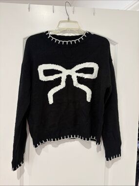 SHEIN Black Crewneck Sweater with White Bow Graphic